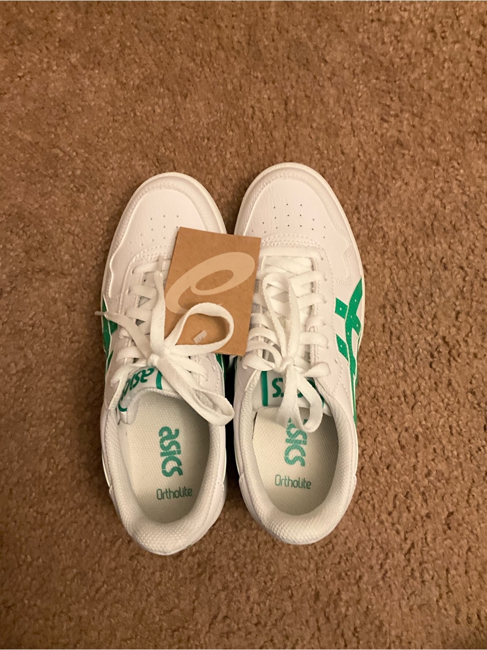 ASICS women’s White Sneakers with Green Stripes